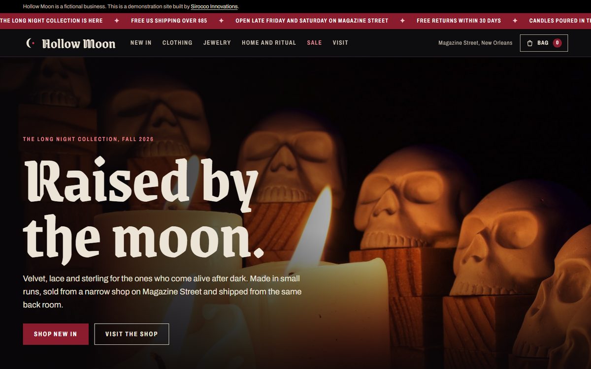 The Hollow Moon home page, candlelit carved skulls beside the headline Raised by the moon